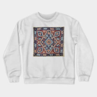 Embroidered Pillow with Blue, Tan, and Red Crewneck Sweatshirt